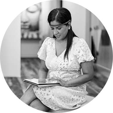 Black and white thumbnail of a woman using a neurofeedback headband and tablet at Zen Waves Clinic
